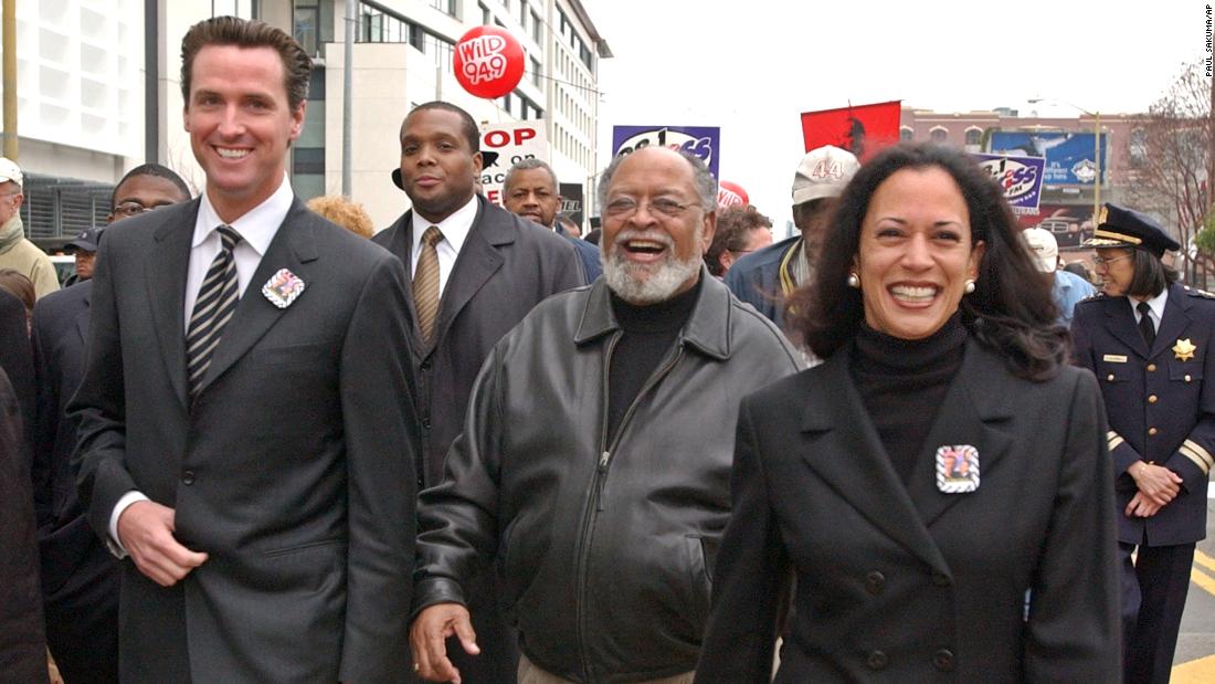 Harris is joined by San Francisco Mayor Gavin Newsom, left, and the Rev. Cecil  Williams, center, for a San Francisco march celebrating Martin Luther King Jr. in January 2004. Harris was the city&#39;s district attorney from 2004 to 2011.
