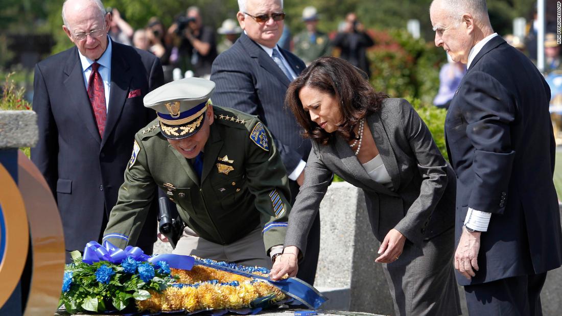In May 2013, Harris and California Highway Patrol Commissioner Joe Farrow place a wreath honoring Highway Patrol officers who were killed in the line of duty. 