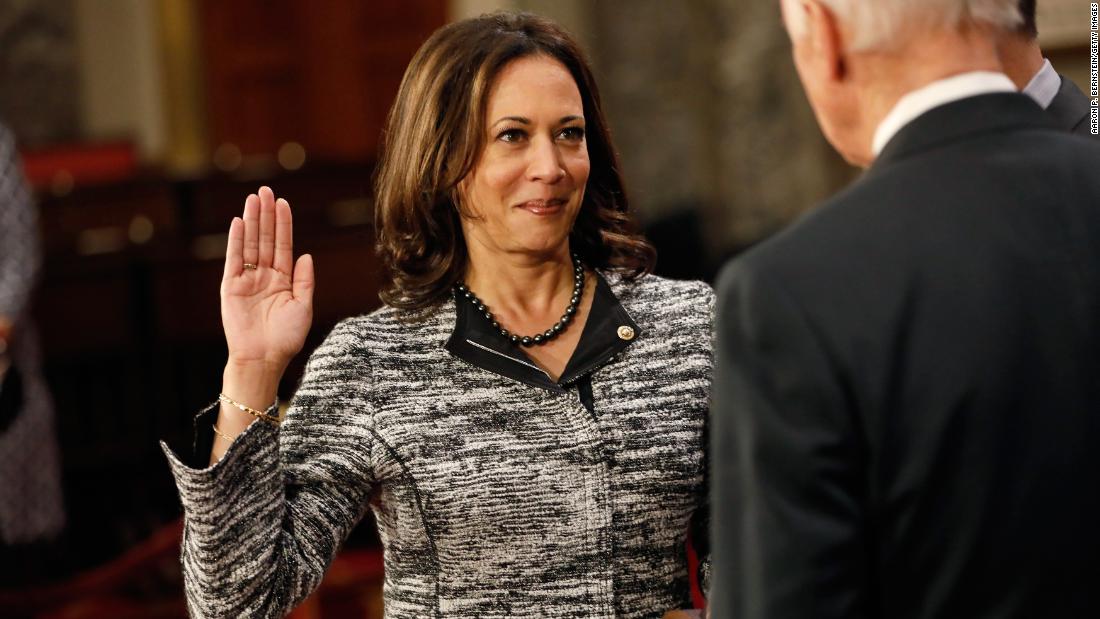 Harris, as a new member of the Senate, participates in a re-enacted swearing-in with Vice President Joe Biden in January 2017. She is the first Indian-American and the second African-American woman to serve as a US senator.