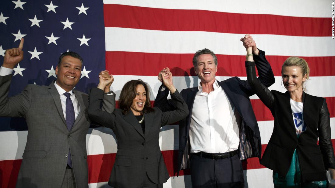 Harris attends a rally with, from left, California Secretary of State Alex Padilla, gubernatorial candidate Gavin Newsom, and Newsom&#39;s wife, Jennifer, in May 2018. Newsom won the election in November.