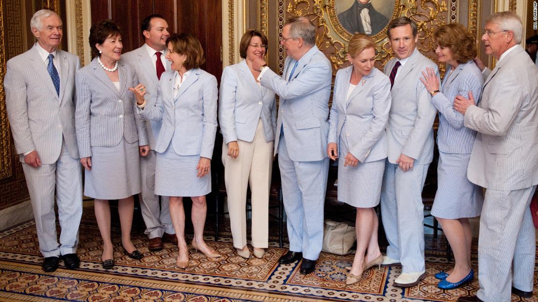 Gillibrand, fourth from right, and other senators wear seersucker suits in Washington in June 2011. The third Thursday of June is traditionally called Seersucker Thursday.