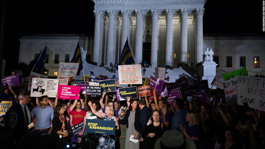 Gillibrand speaks to demonstrators outside the Supreme Court after President Donald Trump announced Brett Kavanaugh as a Supreme Court nominee in July 2018.