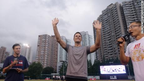 Brady waves to fans during a promotional event in Shanghai in 2017.