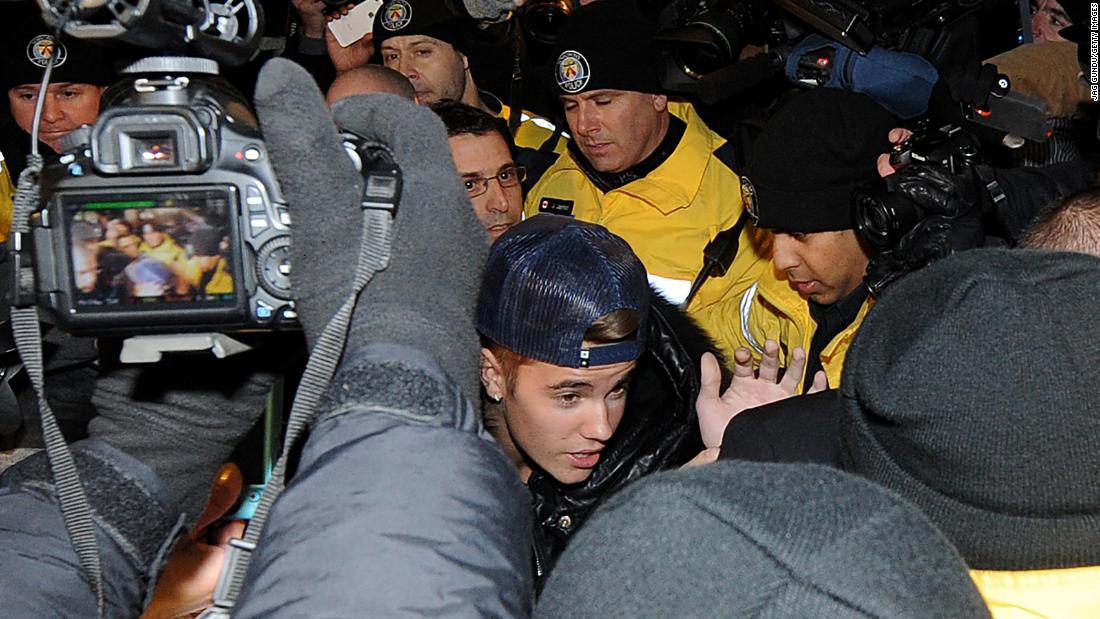 Days after his arrest in Miami Beach, Bieber appears at a police station in Toronto where he was charged with assaulting a limo driver in December 2013. &lt;a href=&quot;https://www.cnn.com/2014/09/08/showbiz/justin-bieber-charge-dropped/index.html&quot; target=&quot;_blank&quot;&gt;That charge was later dropped.&lt;/a&gt; But in early 2015, Bieber was found guilty of assault and careless driving. Those charges stemmed from an incident in August 2014, when &lt;a href=&quot;https://www.cnn.com/2015/06/04/entertainment/feat-justin-bieber-guilty-canada/&quot; target=&quot;_blank&quot;&gt;Bieber&#39;s ATV collided with a minivan&lt;/a&gt; in Stratford, Ontario.