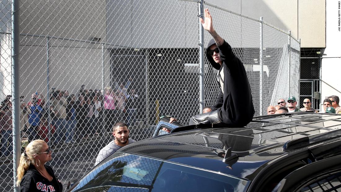 Bieber waves after exiting the correctional center following his arrest. Earlier that month, sheriff&#39;s deputies searched his California home over the egging of a neighbor&#39;s house. &lt;a href=&quot;https://www.cnn.com/2014/07/09/showbiz/justin-bieber-vandalism/&quot; target=&quot;_blank&quot;&gt;Bieber later accepted a plea deal&lt;/a&gt; to settle a misdemeanor vandalism charge.
