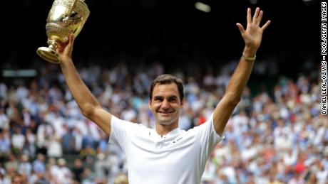 LONDON, ENGLAND - JULY 16:  Roger Federer of Switzerland celebrates victory with the trophy after the Gentlemen&#39;s Singles final against  Marin Cilic of Croatia on day thirteen of the Wimbledon Lawn Tennis Championships at the All England Lawn Tennis and Croquet Club at Wimbledon on July 16, 2017 in London, England.  (Photo by Daniel Leal-Olivas - Pool/Getty Images)