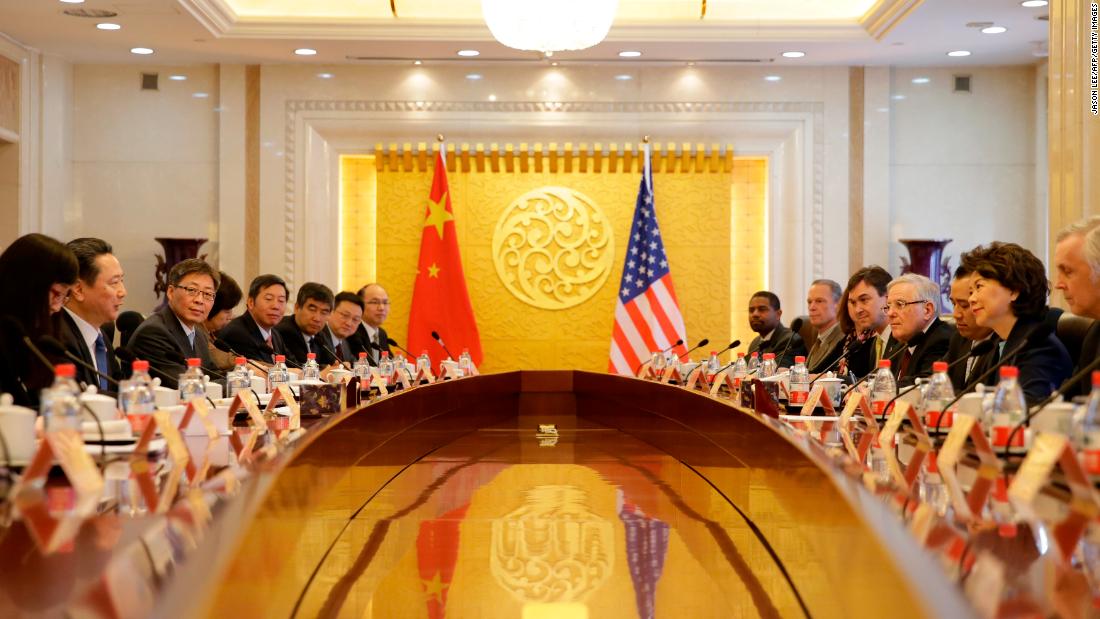 Chinese Transport Minister Li Xiaopeng (2nd L) speaks to US Secretary of Transportation Elaine Chao (2nd R) during a meeting at the Ministry of Transport of China in Beijing on April 27, 2018. (Photo by JASON LEE / POOL / AFP)        (Photo credit should read JASON LEE/AFP/Getty Images)