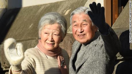 Japan's Emperor Akihito and Empress Michiko wave to well-wishers near the Hayama Imperial Villa in Kanagawa Prefecture on January 21, 2019.