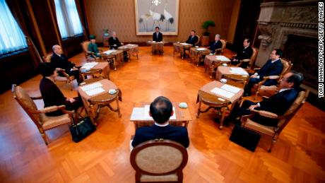 Japan&#39;s Prime Minister Shinzo Abe attends a meeting of the Imperial Household Council to discuss the timeline for the abdication of Japan&#39;s Emperor Akihito on December 1, 2017. 