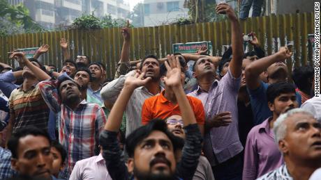 Rescue underway to free people trapped in deadly Dhaka tower fire