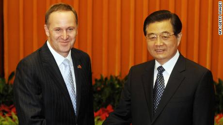 New Zealand Prime Minister John Key (L) shakes hands with Chinese President Hu Jintao during their meeting at the Great Hall of the People in Beijing on April 14, 2009.