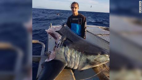 A huge mako shark caught by an Australian fisherman was half-devoured by an even bigger predator.