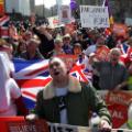 Pro-Brexit demonstrators carry placards and Union flags as they gather in Parliament Square in central London on March 29, 2019. - MPs are set for a momentous third vote today on Prime Minister Theresa May&#39;s Brexit deal, which could end a months-long political crisis or risk Britain crashing out of the EU in two weeks. (Photo by Daniel LEAL-OLIVAS / AFP)        (Photo credit should read DANIEL LEAL-OLIVAS/AFP/Getty Images)