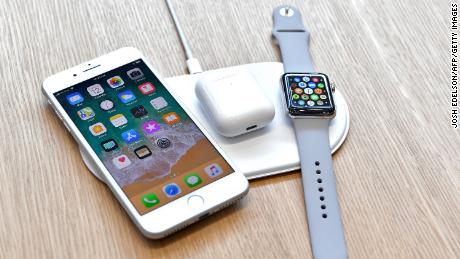 An AirPower mat is seen charging multiple devices during a media event at Apple&#39;s new headquarters in Cupertino, California on September 12, 2017. 