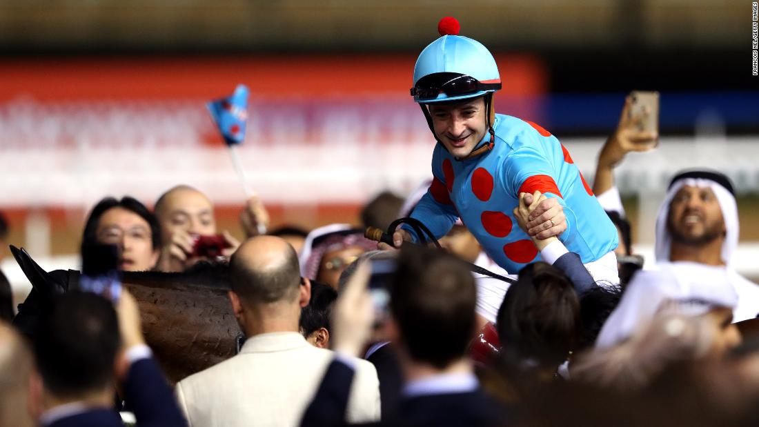 Christophe Lemaire riding Almond Eye celebrates after winning the Dubai Turf at the Dubai World Cup on March 30 in Dubai.