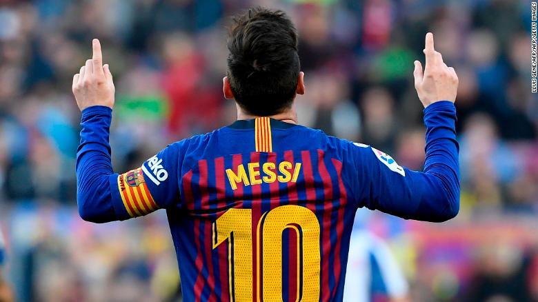 Barcelona&#39;s Argentinian forward Lionel Messi celebrates after scoring a second goal during the Spanish league football match between FC Barcelona and RCD Espanyol at the Camp Nou stadium in Barcelona on March 30, 2019. (Photo by LLUIS GENE / AFP)        (Photo credit should read LLUIS GENE/AFP/Getty Images)