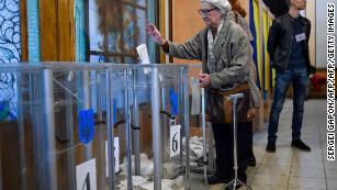 A woman casts her ballot at a polling station in Kiev during Sunday's election.