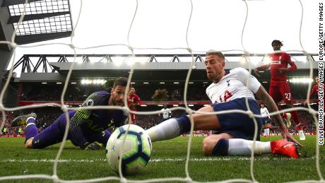 Toby Alderweireld is unable to stop the ball crossing the line for Liverpool&#39;s second goal.