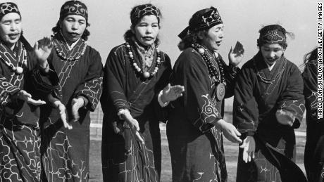 Ainu people  occupying parts of the Japanese island of Hokkaido, Russian Kuril Islands and Sakhalin, in about 1950.