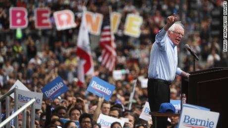 2020 Democratic presidential candidate U.S. Sen. Bernie Sanders (I-VT), R, speaks at a campaign rally in Grand Park on March 23, 2019 in Los Angeles, California.  (Mario Tama/Getty Images)