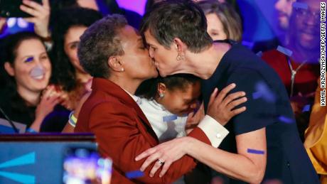 Lori Lightfoot kisses her wife, Amy Eshleman, after being elected Chicago&#39;s first black gay woman mayor.