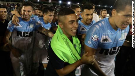 Racing Club players celebrate just the club&#39;s third league title since 1966.