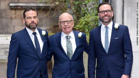 Rupert Murdoch accompanied by his sons James (right) and Lachlan (left).