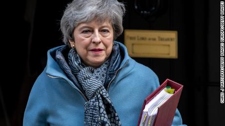 British Prime Minister Theresa May leaves Downing Street for Prime Minister&#39;s Questions.