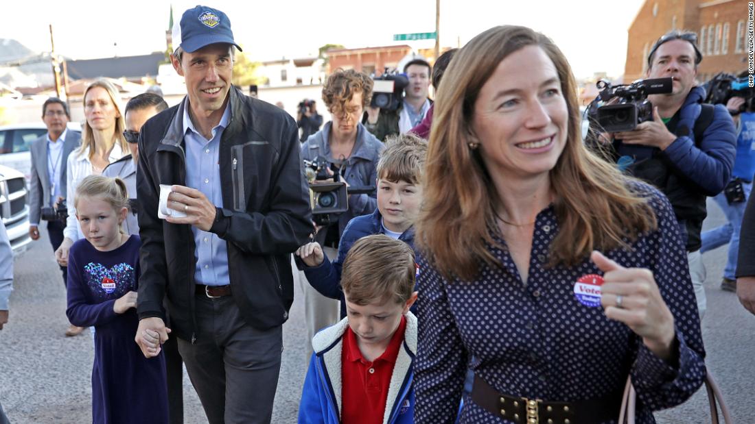 The O&#39;Rourkes walk home after voting in El Paso in November 2018.