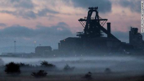 REDCAR, ENGLAND - SEPTEMBER 29:  Dawn breaks over the blast furnace at the SSI UK steel plant on September 29, 2015 in Redcar, England. Following the announcement that SSI UK are mothballing the plant and ceasing steel production 1700 jobs at the Teesside site have been lost.  (Photo by Ian Forsyth/Getty Images)
