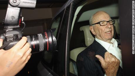 LONDON, ENGLAND - JULY 12:  Rupert Murdoch, the chief executive officer of News Corp., is driven from his apartment on July 12, 2011 in London, England. Allegations emerged yesterday that private investigators working for The Sun and The Sunday Times newspapers, owned by Mr Murdoch&#39;s company, targeted former Prime Minister Gordon Brown to obtain bank details and his son&#39;s medical records.  (Photo by Oli Scarff/Getty Images)