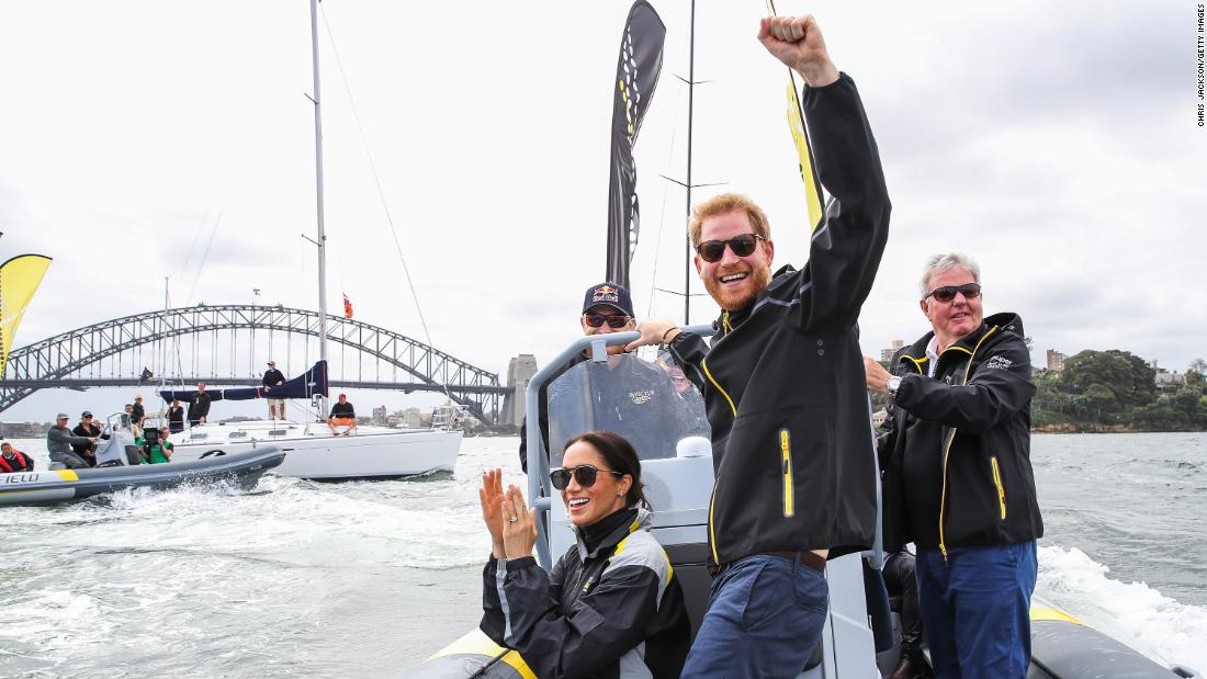 Meghan and Harry cheer on sailors during the Invictus Games in Australia in October 2018.