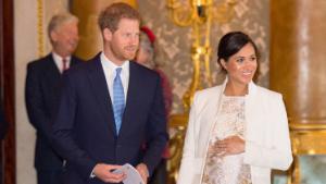 Britain&#39;s Prince Harry, Duke of Sussex, (L) and Britain&#39;s Meghan, Duchess of Sussex (R) attend a reception to mark the 50th Anniversary of the investiture of The Prince of Wales at Buckingham Palace in London on March 5, 2019. - The Queen hosted a reception to mark the Fiftieth Anniversary of the investiture of Britain&#39;s Prince Charles, her son, as the Prince of Wales. Prince Charles was created The Prince of Wales aged 9 on July 26th 1958 and was formally invested with the title by Her Majesty The Queen on July 1st 1969 at Caernarfon Castle.