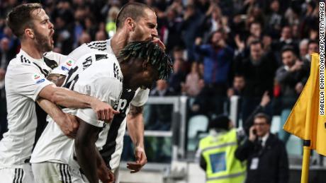 Leonardo Bonucci (middle) celebrates with Moise Kean (right) as Juventus beat AC Milan 2-1 in Serie A. Bonucci had said on Tuesday Kean was partially to blame after he was racially abused at Cagliari. 