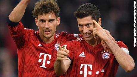 Robert Lewandowski scored his 200th Bundesliga goal as Bayern Munich thrashed Dortmund 5-0. 