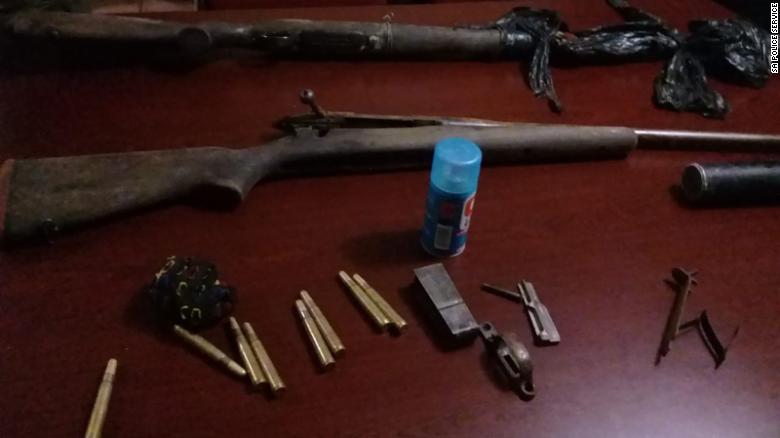 Police say they arrested three men and seized guns following the alleged poacher&#39;s death. 
