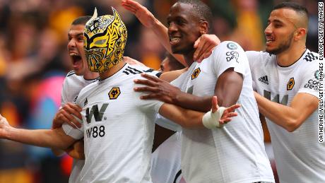 Raul Jimenez dons a mask after scoring for Wolves in the FA Cup semifinals. 