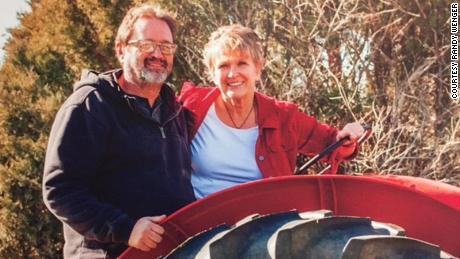 Randy Wenger with his wife on his family farm in Colorado.