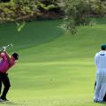 Masters photos A-Z caddies 13th Patrick Reed