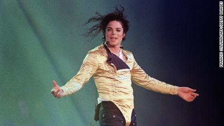 Michael Jackson preforms before an estimated audience of 60,000 in Brunei on July 16, 1996.