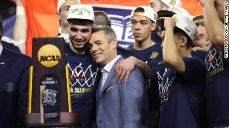 MINNEAPOLIS, MINNESOTA - APRIL 08:  Ty Jerome #11 and head coach Tony Bennett of the Virginia Cavaliers celebrate their teams 85-77 win over the Texas Tech Red Raiders to win the the 2019 NCAA men&#39;s Final Four National Championship game at U.S. Bank Stadium on April 08, 2019 in Minneapolis, Minnesota. (Photo by Streeter Lecka/Getty Images)