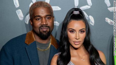 NEW YORK, NEW YORK - DECEMBER 02: Kanye West and Kim Kardashian West attend the the Versace fall 2019 fashion show at the American Stock Exchange Building in lower Manhattan on December 02, 2018 in New York City. (Photo by Roy Rochlin/Getty Images)