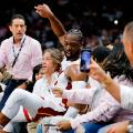 MIAMI, FLORIDA - APRIL 09:  Dwyane Wade #3 of the Miami Heat falls into the fans after shooting a three pointer against the Philadelphia 76ers during the second half at American Airlines Arena on April 09, 2019 in Miami, Florida. NOTE TO USER: User expressly acknowledges and agrees that, by downloading and or using this photograph, User is consenting to the terms and conditions of the Getty Images License Agreement.  (Photo by Michael Reaves/Getty Images)