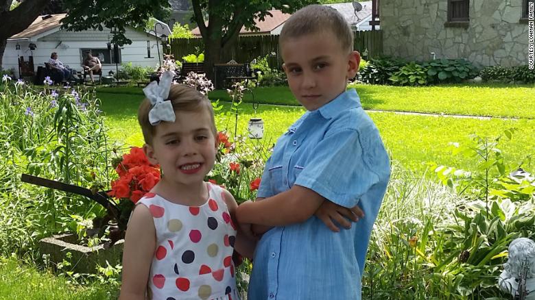 Rosie Lohman, left, poses with her brother in 2017. Rosie has been raised as a girl, but her parents refer to her as intersex and encourage gender fluidity.