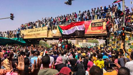 Protesters rally at a demonstration near the military headquarters, Tuesday, April 9, 2019, in the capital Khartoum, Sudan. Activists behind anti-government protests in Sudan say security forces have killed at least seven people, including a military officer, in another attempt to break up the sit-in outside the military headquarters in Khartoum. A spokeswoman for the Sudanese Professionals Association, said clashes erupted again early Tuesday between security forces and protesters who have been camping out in front of the complex in Khartoum since Saturday. (AP Photo)