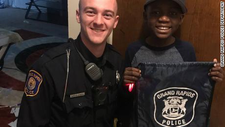 Officer Austin Lynema and Thomas Daniel.