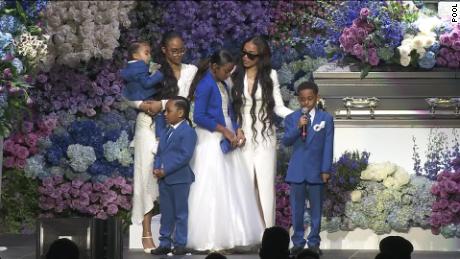 Family members and girlfriend Lauren London, second from right, paid tribute to the rapper. 