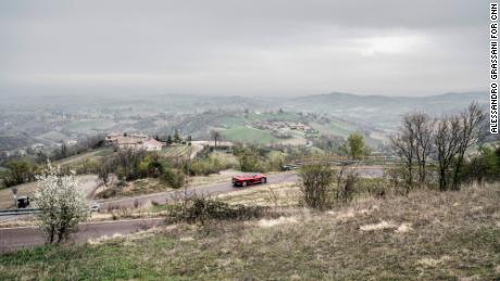 De Simone test drives a Ferrari Portofino on the hills around Maranello.