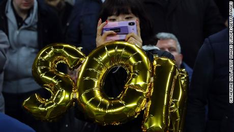  A fan of Son Heung-min of Tottenham Hotspur with a balloon honoring the South Korea star. 