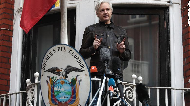 Julian Assange speaks to the media from the balcony of the Embassy Of Ecuador on May 19, 2017 in London, England. 